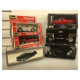 Six 1:24scale die cast vehicles, all Mint in