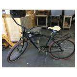 Huffy bicycle, one tire holds hair other one