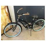 Black and blue Bicycle, both wheels are flat