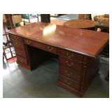 Wooden desk by OFS has metal Hardware, approx