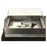 Metal toolbox with assorted gun parts