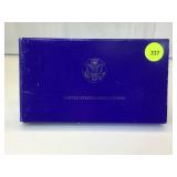 1986 Silver Liberty Dollar and Clad Half Dollar