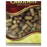 Collection of wine corks in box.