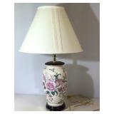 Table lamp with shade.