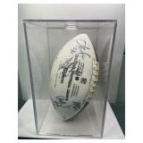 Autographed football in case