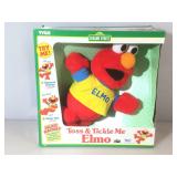 Toss & Tickle me Elmo in original box.