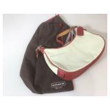 Cream and Red Coach handbag with dust protector