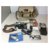 Canon AV1 35mm camera with accessories in Nikon
