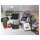 Magnavox dvd player and assorted dvds.