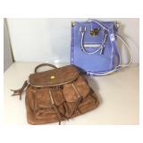 Pair of fashion purses, one still has the price