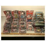 Lot of 25 1:64 scale die cast cars, mostly