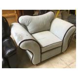 White armchair w/purple accents