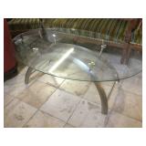 Oval Glass top coffee table, approx 32x51x18
