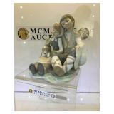 Lladro figurine, 6.5in. Ht, Boy/girl with puppie,