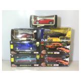 7 die cast 1:24 scale model vehicles, all mib,
