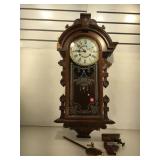 Keywind wall clock, key and pendulum, approx 34