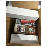 Large box full of sports cards