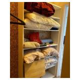 Shelf Lot of Linens, pillows, clothes and more