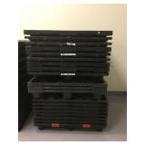 STACK OF ULINE H-1023 PLASTIC PALLETS STACK OF ULINE H-1023 PLASTIC PALLETS