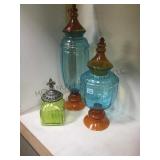 GROUP OF HAND BLOWN GLASS JARS WITH LIDS
