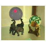 SET OF SIGNED PAPERWEIGHTS ON ELEPHANT BASES