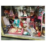 SHELF LOT OF DOLLS, BABY NATI, BARBIES, & MORE