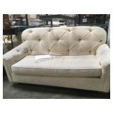 CREAM COLORED SOFA