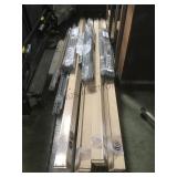 STACK OF SHELVING BRACKETS