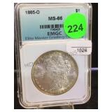 1885-O MORGAN SILVER DOLLAR, CASED & GRADED 1885-O MORGAN SILVER DOLLAR, CASED & GRADED
