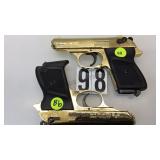 PAIR OF VOLTRAN MAJOR METAL PROP PISTOLS GOLD PAIR OF VOLTRAN MAJOR METAL PROP PISTOLS GOLD
