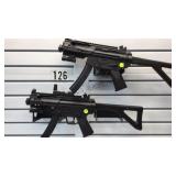 PAIR OF PLASTIC MP 5 A 7 PROP GUNS