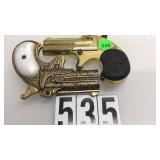 PAIR OF METAL GOLD STARTING DERRINGERS PAIR OF METAL GOLD STARTING DERRINGERS