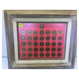 FRAMED COLLECTION OF BRASS PRESENDIAL TOKENS