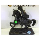 CAST METAL COWBOY ON HORSE FIGURE MADE BY THE