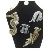 ASSORTMENT OF RHINESTONE BROOCHES ASSORTMENT OF RHINESTONE BROOCHES
