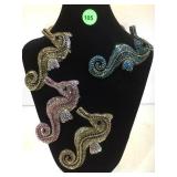 ASSORTMENT OF RHINESTONE SEA HORSE BROOCHS