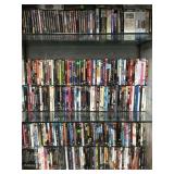 3 SHELF LOT OF HUNDREDS OF DVD