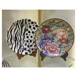 A PAIR OF LARGE DECORATOR PLATES ONE SIGNED A PAIR OF LARGE DECORATOR PLATES ONE SIGNED