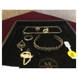 STERLING BRACELET W/ ASSORTED STERLING PIECES STERLING BRACELET W/ ASSORTED STERLING PIECES