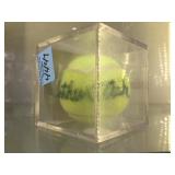 CASED TENNIS BALL AUTOGRAPHED BY ARTUR ASH CASED TENNIS BALL AUTOGRAPHED BY ARTUR ASH