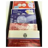 TRAY OF VARIOUS UNCIRCULATED COIN SETS TRAY OF VARIOUS UNCIRCULATED COIN SETS