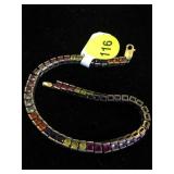MULTI GEMSTONE TENNIS BRACELET W/GOLD CLASPS
