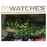 2 FAUX PLANTS IN BASKETS