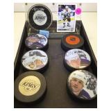 ENCASED TRADING CARD & KINGS HOCKEY PUCKS