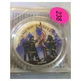 2001 'AMERICAN HEROES' COLORIZED SILVER DOLLAR