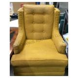 GOLD UPHOLSTERED EASY CHAIR W/CASTERS
