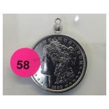 1889-O MORGAN SILVER DOLLAR WITH BEZEL