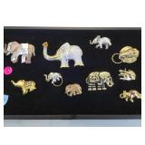 TRAY OF METAL ABOLONE ,RHINESTONE ELEPHANT PINS