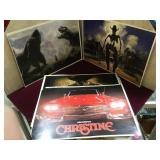 STACK OF MOVIE & ART PRINTS