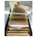 TIN OF COLLECTABLE STAMPS